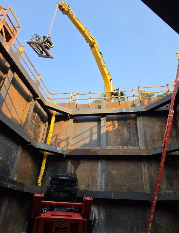 Lowering material for a Helical Pier System
