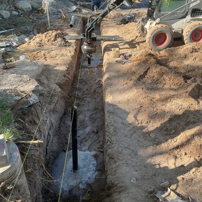 Helical Pier Installation to build a retaining wall for ABQ Bio Park Botanical Gardens